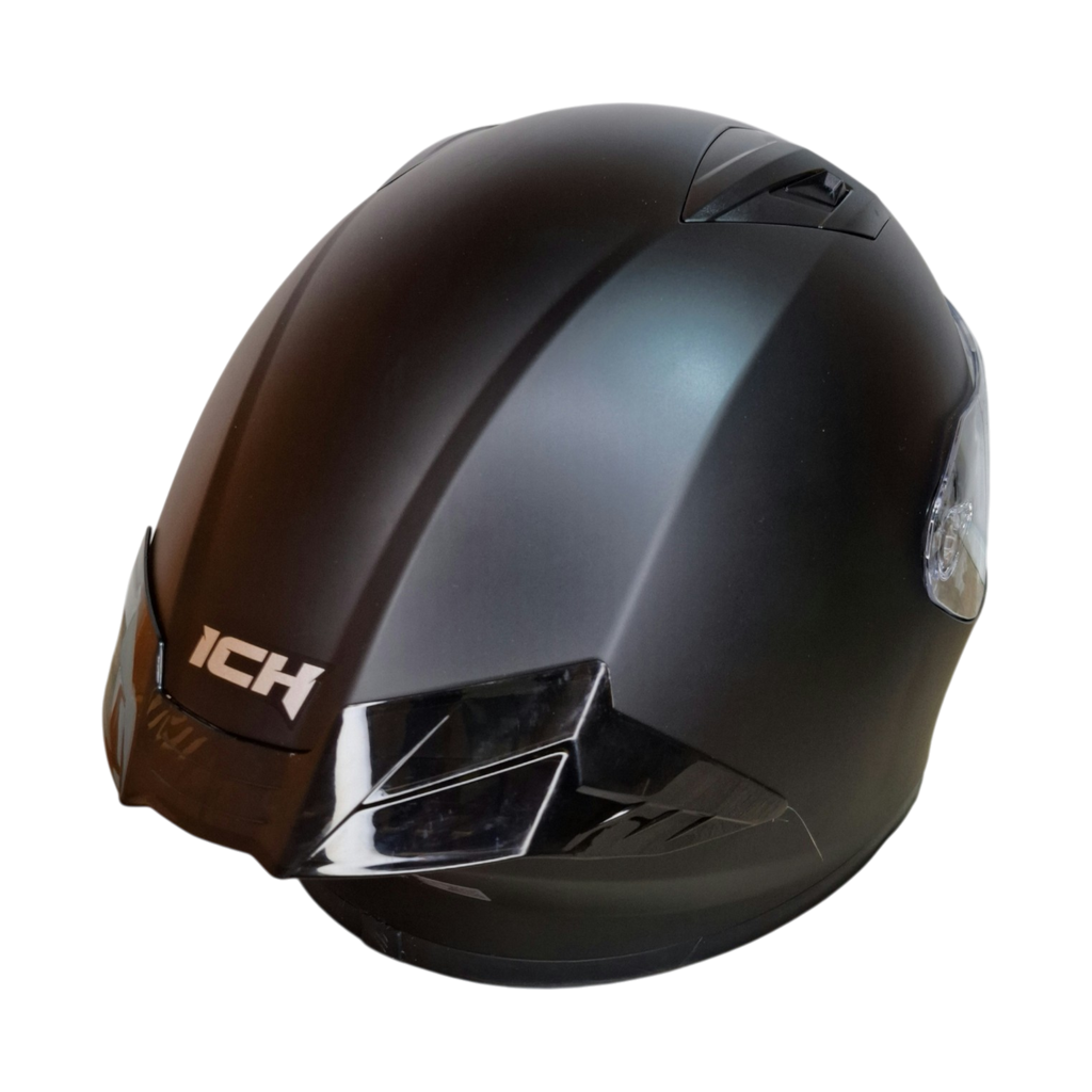 Casco integral ICH 503 Solid en color negro mate con diseño aerodinámico y visor transparente.